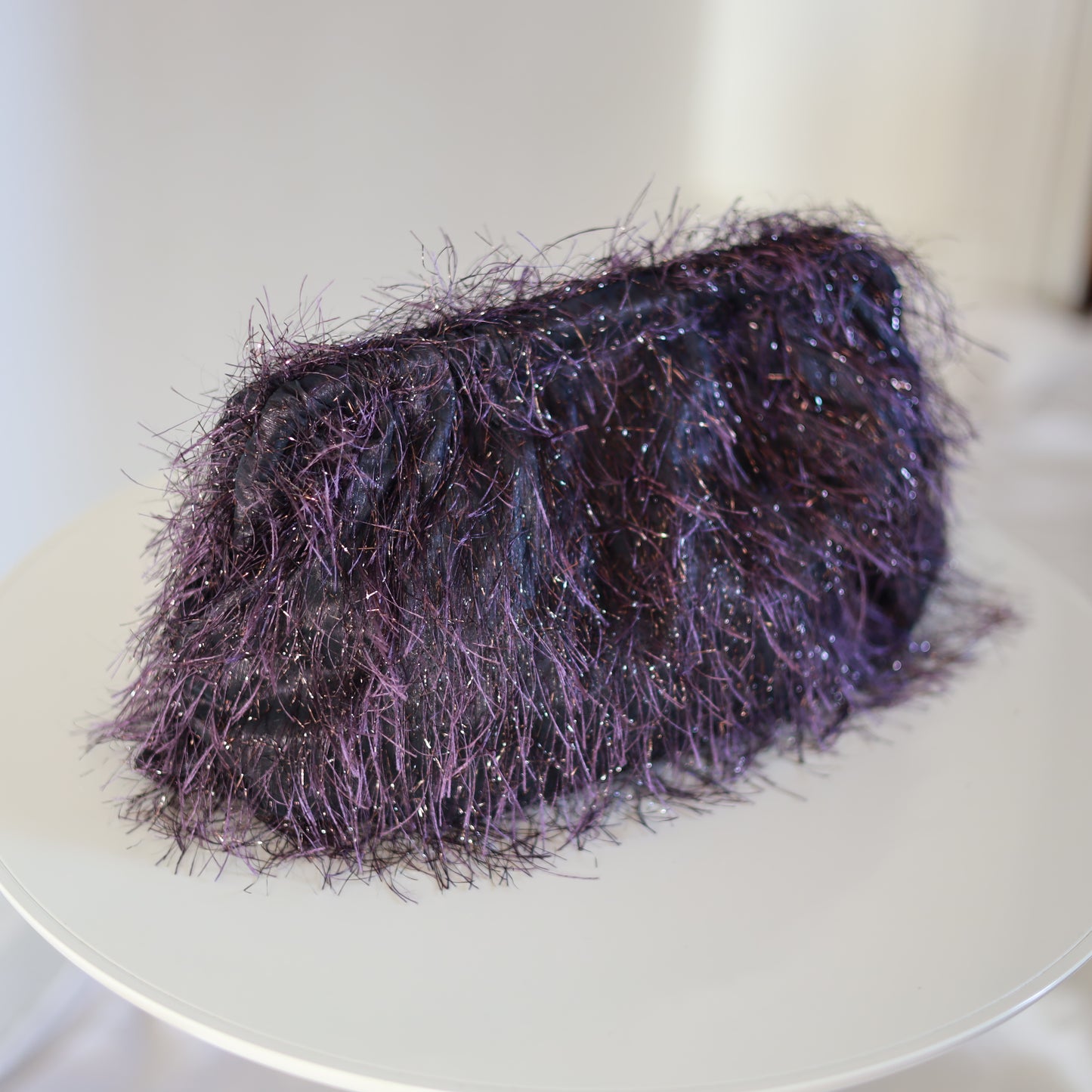 Clutch in Seta con piume